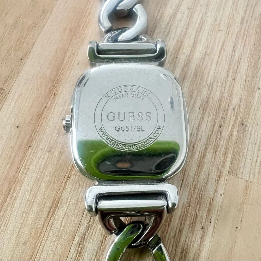 Guess ladies rectangular black dial silver tone  bracelet watch NEW BATTERY